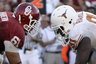 FILE - In this Oct. 2, 2010, file photo, Texas defensive tackle Kheeston Randall (91) and Oklahoma offensive linesman Ben Habern (61) line up during an NCAA football game at the Cotton Bowl in Dallas. Since 1912, the Sooners and Longhorns have played all but three of their games in Dallas--halfway between Austin, Texas, and Norman, Okla. And since 1932, the Cotton Bowl has been the site and the game has been played during the Texas State Fair. (AP Photo/LM Otero, File)