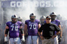 FORT WORTH TX - OCTOBER 16:  Head coach Gary Patterson of the TCU Horned Frogs takes to the field with offensive guard Josh Vernon #78 and tackle Zach Roth #70 against the BYU Cougars at Amon G. Carter Stadium on October 16 2010 in Fort Worth Texas.  (Photo by Tom Pennington/Getty Images)