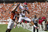 DALLAS, TX - OCTOBER 8:   Kenny Stills #4 of the Oklahoma Sooners catches a touchdown pass over Adrian Phillips #17 of the Texas Longhorns at the Cotton Bowl on October 8, 2025 in Dallas, Texas.  The Sooners defeated the Longhorns 55 to 17.  (Photo by Wesley Hitt/Getty Images)