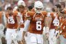 Texas quarterback Case McCoy (6) heads to the sideline during the first half of an NCAA college football game against Oklahoma at the Cotton Bowl in Dallas, Saturday, Oct. 8, 2011.  (AP Photo/LM Otero)