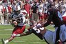 South Carolina tailback Marcus Lattimore (21) evades a tackle from Mississippi State line backer Brandon Wilson (58) to score a second quarter touchdown during an NCAA college football game in Starkville, Miss., Saturday, Oct. 15, 2011. (AP Photo/Kerry Smith)