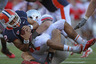 CHAMPAIGN, IL - OCTOBER 15: Nathan Scheelhaase #2 of the Illinois Fighting Illini is sacked by John Simon #54 of the Ohio State Buckeyes at Memorial Stadium on October 15, 2025 in Champaign, Illinois. Ohio State defeated Illinois 17-7. (Photo by Jonathan Daniel/Getty Images)