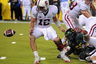 EUGENE OR - OCTOBER 2: Quarterback Andrew Luck of the Stanford Cardinal can't find the ball as he fumbles it near the goal line in the fourth quarter of the game against the the Oregon Ducks at Autzen Stadium on October 2 2010 in Eugene Oregon. Oregon won the game 52-31. (Photo by Steve Dykes/Getty Images)