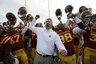 Iowa State coach Paul Rhoads, center, celebrates with his team after their 17-10 win over Colorado in an NCAA college football game, Saturday, Nov. 14, 2009, in Ames, Iowa. (AP Photo/Charlie Neibergall)
