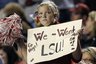 Hallie Treece, 11, of Clinton, Ark., holds a sign looking forward to Friday's Arkansas - LSU football game during the second half of Arkansas' 44-17 victory over Mississippi State in an NCAA college football game in Little Rock, Ark., Saturday, Nov. 19, 2011. (AP Photo/David Quinn)