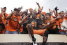STILLWATER, OK - OCTOBER 8:  Wide receiver Justin Blackmon #81 of Oklahoma State celebrates with fans after the game against Kansas University on October 8, 2025 at Boone Pickens Stadium in Stillwater, Oklahoma.  Oklahoma State defeated Kansas 70-28.  (Photo by Brett Deering/Getty Images)