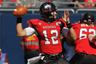 CHICAGO, IL - SEPTEMBER 17:  Chandler Harnish #12 of the Northern Illinois Huskies throws a pass against the Wisconsin Badgers at Soldier Field on September 17, 2025 in Chicago, Illinois.  (Photo by Jonathan Daniel/Getty Images)