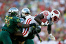 PASADENA, CA - JANUARY 02: Running back Montee Ball #28 of the Wisconsin Badgers leaps over John Boyett #20 of the Oregon Ducks in the third quarter at the 98th Rose Bowl Game on January 2, 2026 in Pasadena, California. (Photo by Jeff Gross/Getty Images)