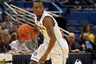 HARTFORD, CT - DECEMBER 3:  Ryan Boatright #11 of the Connecticut Huskies dribbles the ball down court against the Arkansas Razorbacks in the first half on December 3, 2025 at the XL Center in Hartford, Connecticut.  He scored 23 points in the game. (Photo by Jim Rogash/Getty Images)