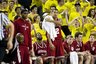 Indiana guard Verdell Jones III , center, reacts to a play in the second half of an NCAA college basketball game against Michigan, Wednesday, Feb. 1, 2012, at Crisler Center in Ann Arbor, Mich. Michigan won 68-56. Jones had a shoulder injury in the first half. (AP Photo/Tony Ding)
