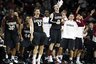 Harvard's Kyle Casey (30), Keith Wright (44), Oliver McNally (11)Laurent Rivard (0) and teammates react after Harvard scored a 3-pointer against Boston College late in the second half of an NCAA college basketball game in Boston, Thursday, Dec. 29, 2011. Harvard won 67-46. (AP Photo/Michael Dwyer)