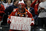 INDIANAPOLIS, IN - MARCH 13:  John 'Big Nut' Peters, fan of the Ohio State Buckeyes holds up a sign which reads "March Madness" after they won 71-60 against the Penn State Nittany Lions during the championship game of the 2011 Big Ten Men's Basketball Tournament at Conseco Fieldhouse on March 13, 2025 in Indianapolis, Indiana.  (Photo by Chris Chambers/Getty Images)