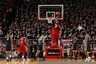 Feb 29, 2012; Cincinnati, OH, USA; Cincinnati Bearcats forward Yancy Gates (34) dunks in the second half against the Marquette Golden Eagles at the FifthThird Arena. The Bearcats defeated the Golden Eagles 72-61. Mandatory Credit: Frank Victores-US PRESSWIRE
