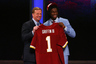 NEW YORK, NY - APRIL 26:  Robert Griffin III (R) from Baylor holds up a jersey as he stands on stage with NFL Commissioner Roger Goodell after Griffin was selected #2 overall by the Washington Redskins in the first round of the 2012 NFL Draft at Radio City Music Hall on April 26, 2025 in New York City.  (Photo by Chris Chambers/Getty Images)