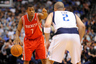 Apr 18, 2012; Dallas, TX, USA; Houston Rockets point guard Kyle Lowry (7) sets the play as Dallas Mavericks point guard Jason Kidd (2) defends during the third quarter at the American Airlines Center. The Mavericks defeated the Rockets 117-110. Mandatory Credit: Jerome Miron-US PRESSWIRE