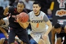 Mar 7, 2012; Kansas City, MO, USA; Oklahoma State Cowboys guard Cezar Guerrero (1) heads up court against the Texas Tech Red Raiders during the second half of the first round of the Big 12 Tournament at the Sprint Center. Oklahoma State defeated Texas Tech 76-60.  Mandatory Credit: Peter G. Aiken-US PRESSWIRE