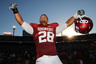 DALLAS - OCTOBER 02:  Linebacker Travis Lewis #28 of the Oklahoma Sooners celebrates a 28-20 win against the Texas Longhorns at the Cotton Bowl on October 2 2010 in Dallas Texas.  (Photo by Ronald Martinez/Getty Images)