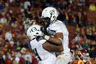 LOS ANGELES CA - OCTOBER 30:  LaMichael James #21 of the Oregon Ducks celebrates his touchdown with Darrion Weems #74 on way to a 53-32 victory over the USC Trojans during the fourth quarter at Los Angeles Memorial Coliseum on October 30 2010 in Los Angeles California.  (Photo by Harry How/Getty Images)