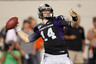 ARLINGTON TX - SEPTEMBER 04: Quarterback Andy Dalton #14 of the TCU Horned Frogs drops back to pass against the Oregon State Beavers at Cowboys Stadium on September 4 2010 in Arlington Texas. (Photo by Ronald Martinez/Getty Images)