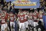 Oklahoma takes the field prior to the Fiesta Bowl NCAA college football game against Connecticut Saturday, Jan. 1, 2011, in Glendale, Ariz. (AP Photo/Ross D. Franklin)
