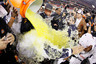 GLENDALE AZ - JANUARY 10:  Quarterback Cameron Newton #2 of the Auburn Tigers dumps gatorade on head coach Gene Chizik as they celebrate the Tigers 22-19 victory with the fans after defeating the Oregon Ducks in the Tostitos BCS National Championship Game at University of Phoenix Stadium on January 10 2011 in Glendale Arizona.  (Photo by Kevin C. Cox/Getty Images)