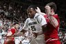 Michigan State's Derrick Nix (25) drives against Indiana's Tom Pritchard in an overtime win over the Hoosiers. These days, every win counts for Michigan State. (AP Photo/Al Goldis)