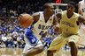 Duke's Nolan Smith (2) drives to the basket as Georgia Tech's Iman Shumpert (1) defends during the first half of an NCAA college basketball game in Durham, N.C., Sunday, Feb. 20, 2011. Duke won 79-57. (AP Photo/Gerry Broome)