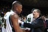 Baylor's LaceDarius Dunn, left, shakes hands with Texas A&M head coach Mark Turgeon, right, following their NCAA college basketball game, Saturday, Feb. 26, 2011, in Waco, Texas. Baylor won 58-51.(AP Photo/Rod Aydelotte)